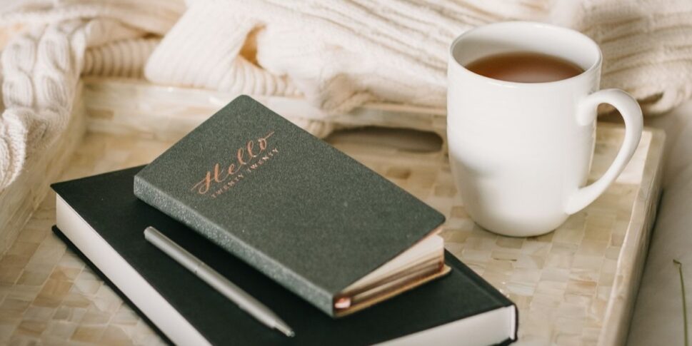 books and coffee on sofa