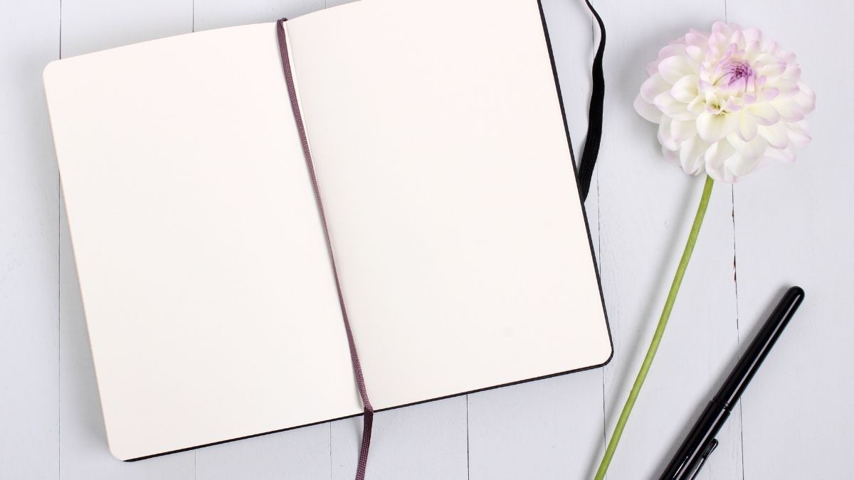 blank notebook with pink flower